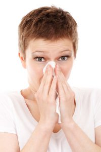 Ode to a Sneeze: The Benefits of Catching a Cold